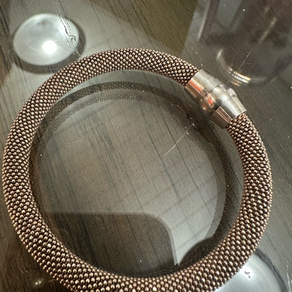 a vintage sterling silver/plated magnetic mesh bracelet
